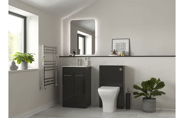 Bathroom interior with dark vanity unit, toilet, and decorative elements.
OXFORD BATHROOM FOCAL POINT