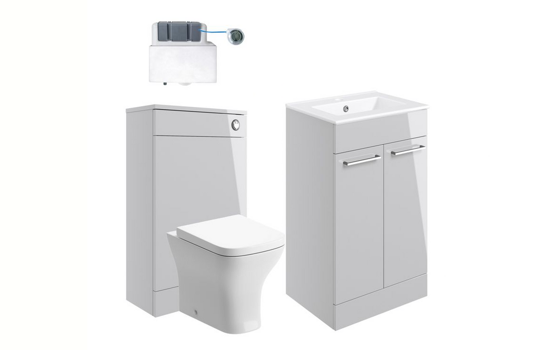 Bathroom interior with gray vanity, toilet, and towel rack.