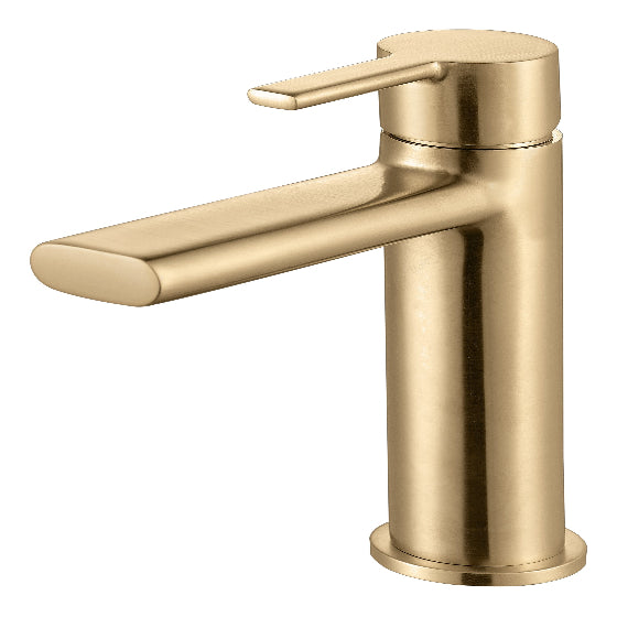 Gold faucet set with handles and drain on a white background